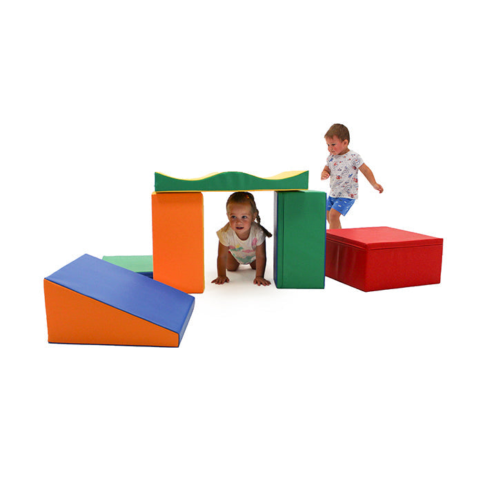 Kids playing with a soft play foam block set