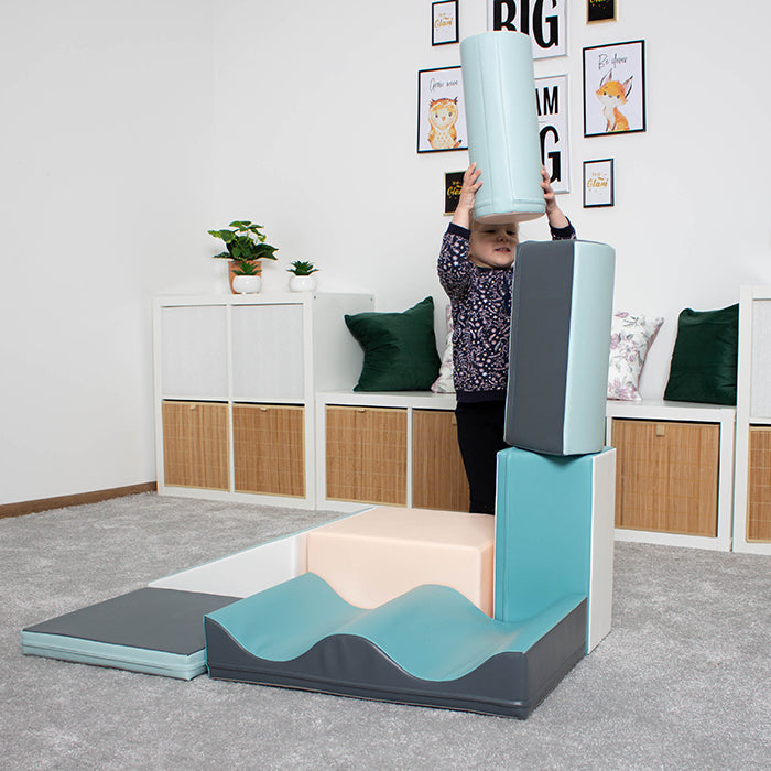 Girl playing with her IGLU foam soft blocks set