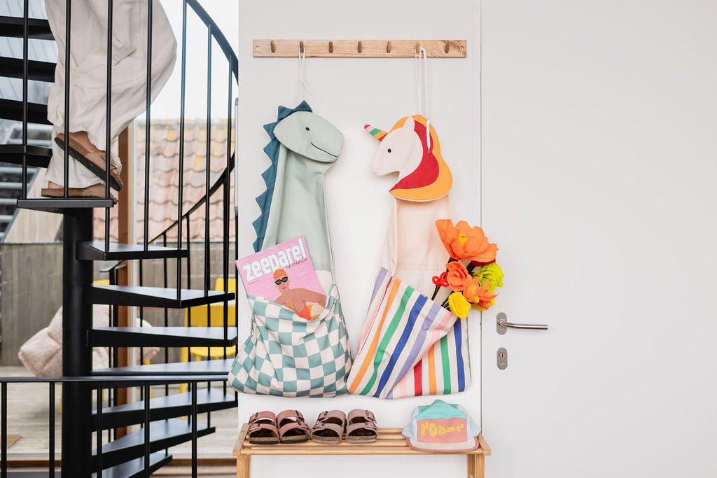 Canvasstof en dinomotief van de Play&amp;Go Toto in detail